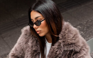 Woman wearing brown coat
