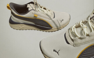 Pair of off-white and multi-coloured PUMA shoes